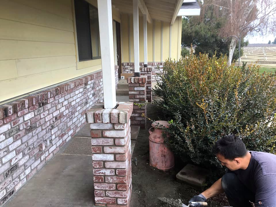 Brick porch columns and wainscot repair by Warrens Masonry Central Valley CA
