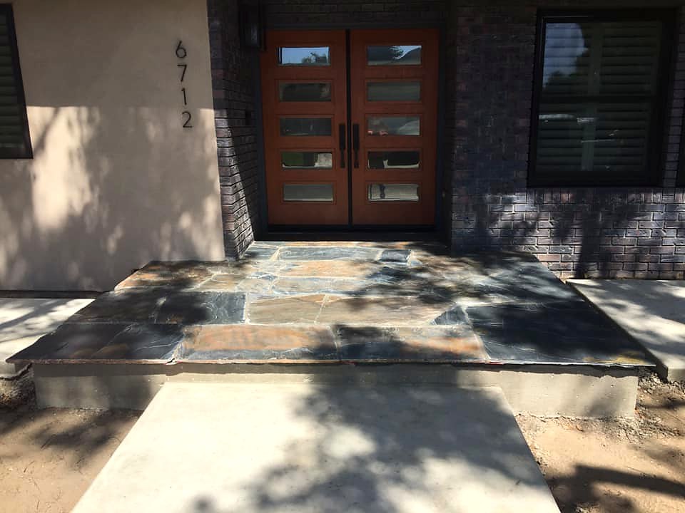 Flagstone front porch with dark brick accents by Warrens Masonry Central Valley CA